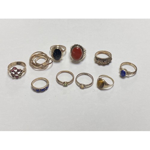 109 - A group of ten silver rings, some stone set -