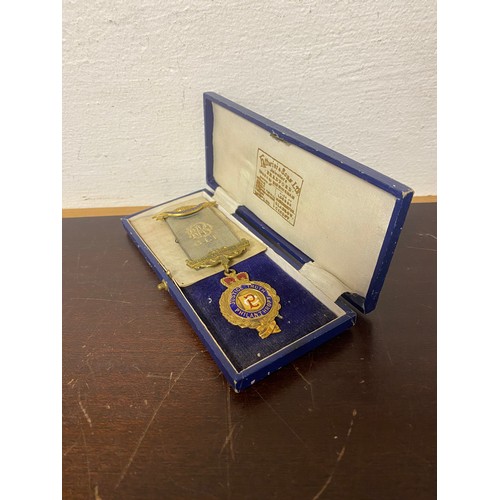 128 - A 9ct gold and enamel RAOB medal, 'Justice Truth Philanthropy' and awarded to Sir Charles Gurney' 19... 