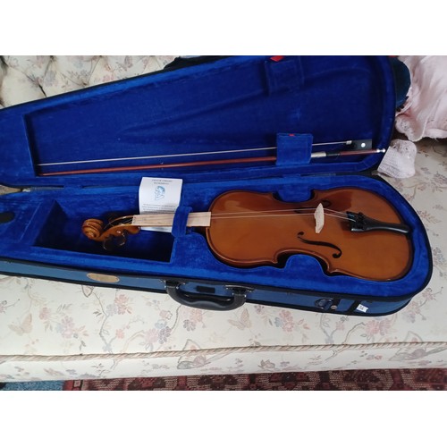 184 - A Stentor student 3/4 size violin and bow, cased -