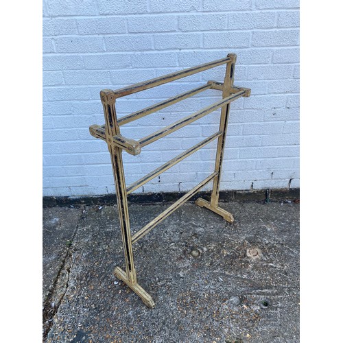 363 - An Arts & Crafts stripped and painted pine rail -