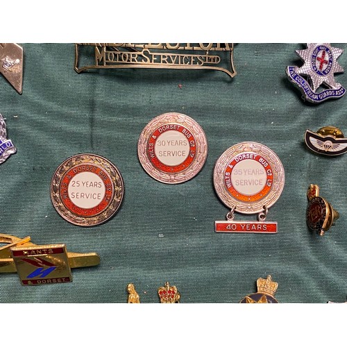 242 - A group of vintage badges, to include silver and enamel Wilts & Dorset Bus Co. Long Service medal, m... 