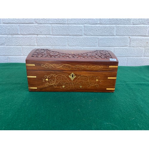 262 - A modern brass inlaid jewellery box, with domed top (with key) -