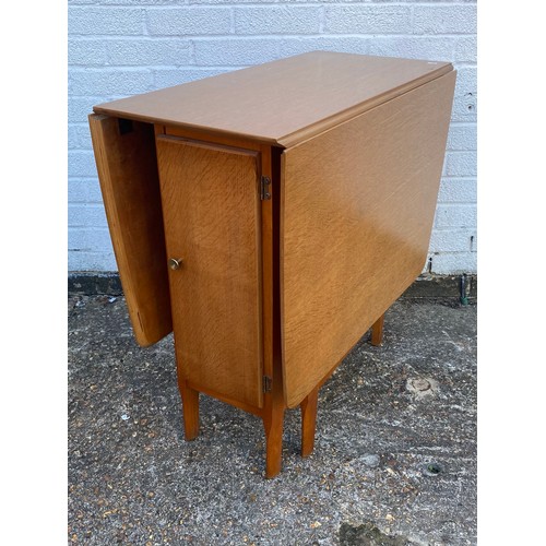 380 - A drop leaf kitchen table -