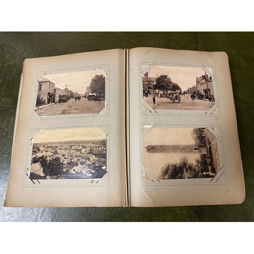 297 - Postcards: a large early 20th century postcard album, containing approximately 320 postcards, includ... 