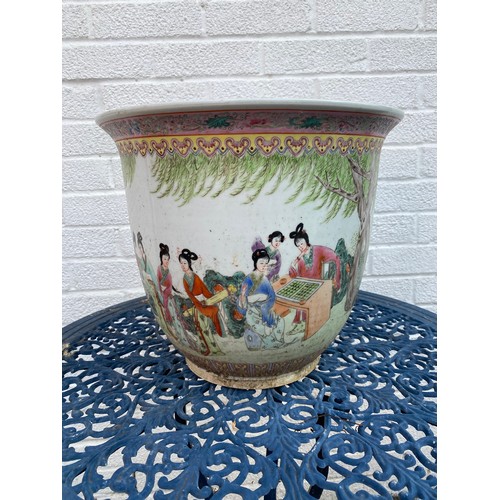 455 - A Chinese famille rose planter, enamelled with figures -