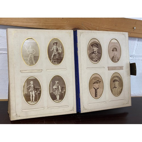 304 - A Victorian photograph album, containing a quantity of carte de visite and photographs, including ni... 