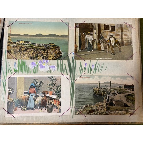 310 - Postcards: a Japanese lacquered album containing 64 postcards, including Japan, Malta, Gibraltar, Ce... 