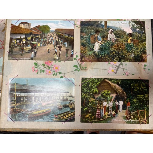 310 - Postcards: a Japanese lacquered album containing 64 postcards, including Japan, Malta, Gibraltar, Ce... 