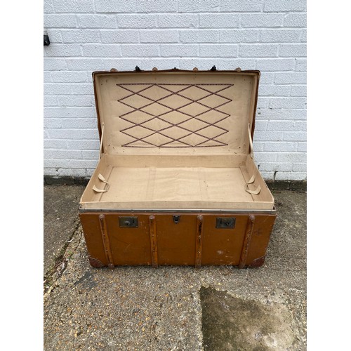 351 - A vintage cane bound trunk -