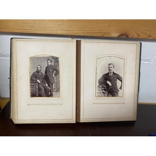 195 - A Victorian album containing approximately 70 carte de visite and photographs -