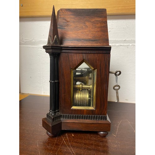 291 - A 19th century rosewood mantel clock, in Gothic style case, the steel dial signed for Litherland Dav... 