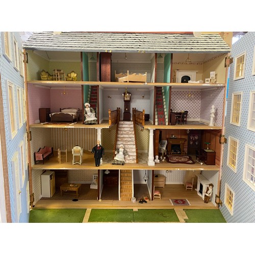 197 - An impressive modern dolls house, modelled as a large Georgian style house, with base and some furni... 