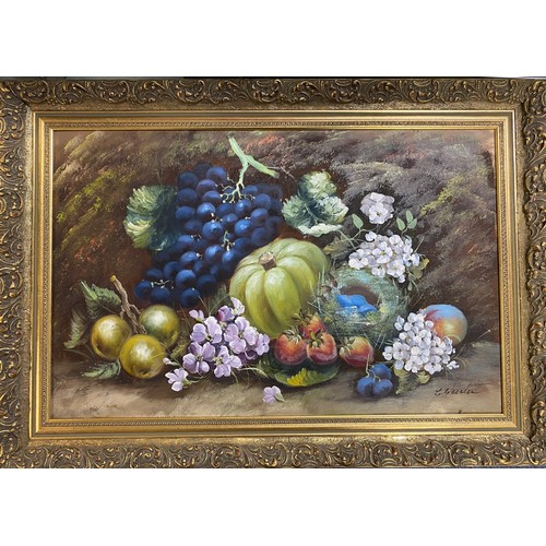 135 - In the style of E Chester, a pair of still life of fruit and flowers, oils on board, both signed -