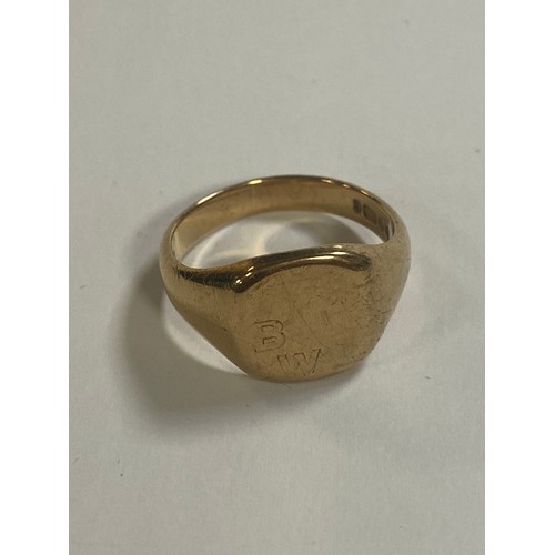 47 - A 9ct gold signet ring, engraved with initials B W -