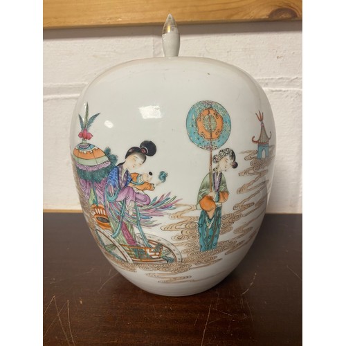 174 - A Chinese jar and cover, possibly 18th century, enamelled with figures to the front and poetic verse... 