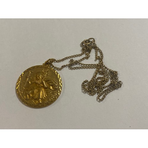 56 - A 9ct gold St Christopher pendant on chain (chain a/f) -