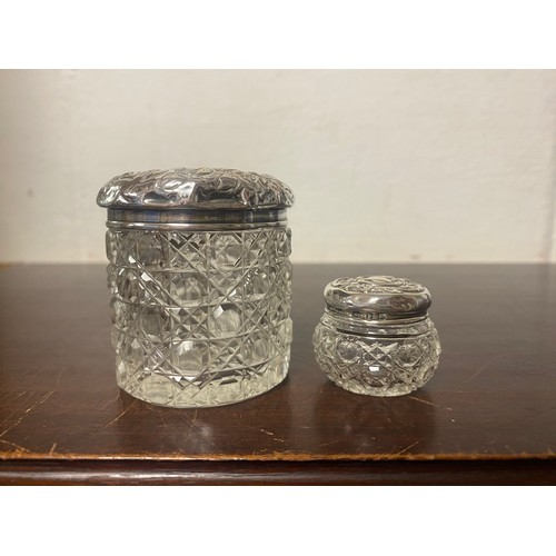 57 - Two silver mount cut glass jars -