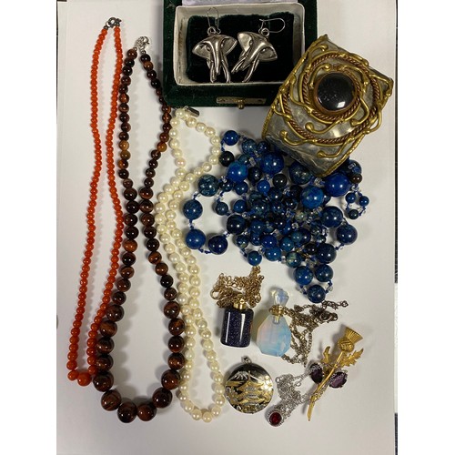 71 - A small quantity of silver and costume jewellery, including silver and enamel brooch, perfume bottle... 