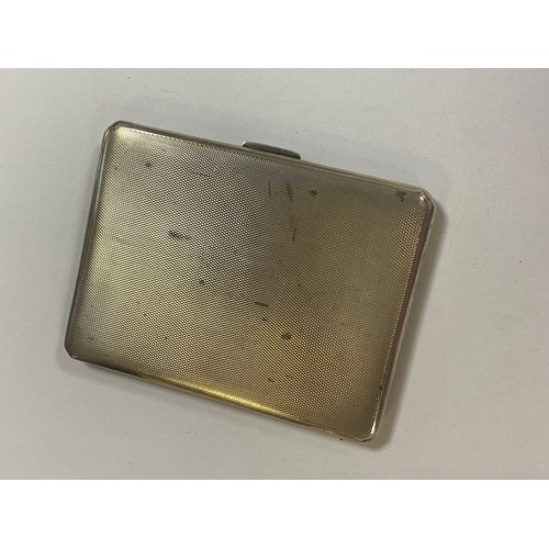 85 - A George VI silver cigarette case, Birmingham 1941, with presentation inscription to interior -