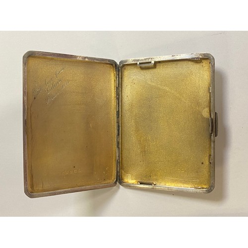 85 - A George VI silver cigarette case, Birmingham 1941, with presentation inscription to interior -