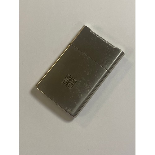 117 - A Givenchy steel lighter -