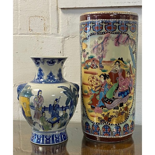 189 - A Chinese style stick stand and a moulded vase (2) -