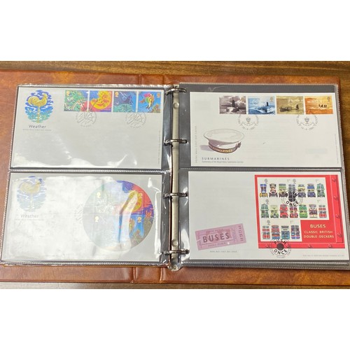 206 - Stamps: a Post Office album containing 60 R M covers, Oct 2000-2005, together with two BFDC cover al... 