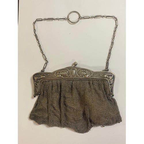 2 - A silver framed mesh purse, stamped 925 and import marks to frame -