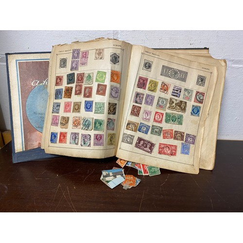 212 - Stamps: a GB and World album, together with a mixed lot of postcards, coins and cigarette cards -