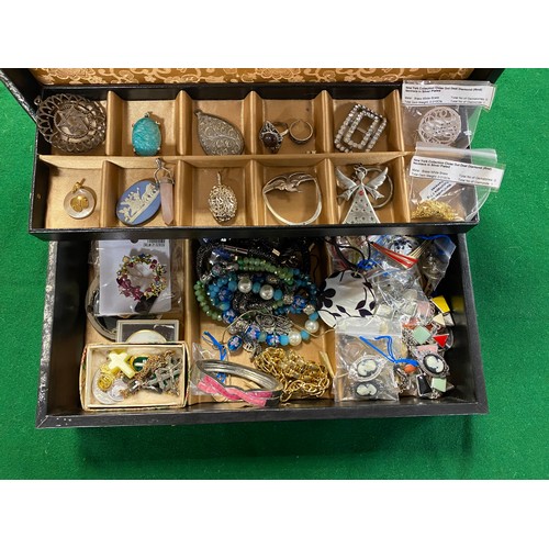 6 - A jewellery box containing a silver Star of David pendant and a quantity of costume jewellery -