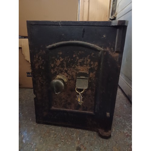 217 - An antique safe, with Lords Invincible Powder Proof lock -