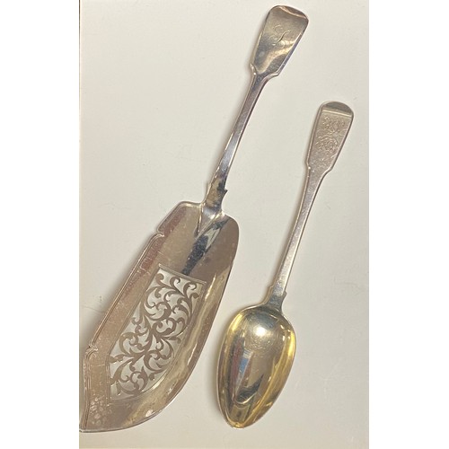 9 - An early Victorian silver fish slice, London 1840, together with a William IV silver spoon -