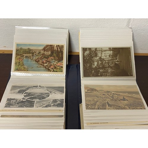 222 - Postcards: An album of approximately 100 vintage postcards, to include R P, topographical, Bournemou... 