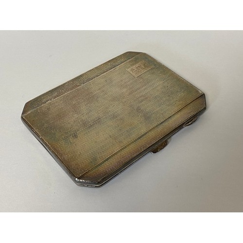 20 - A George VI silver cigarette case, Birmingham 1943 with canted  corners and inscription -