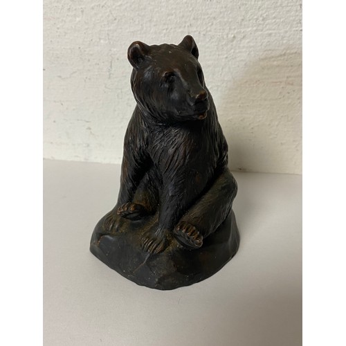 92 - A bronzed effect model of a seated bear -