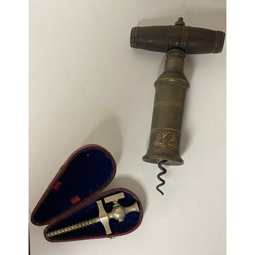 237 - A Victorian champagne tap, together with a Victorian corkscrew, with wooden handle, the brass shaft ... 