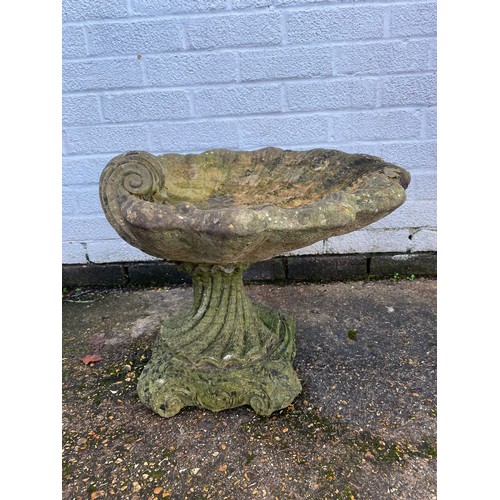 425 - A birdbath, in the form of a shell on stand -