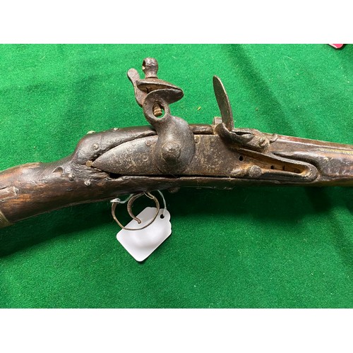 429 - A 19th century Afghan Jezail type smooth bore flint lock rifle -