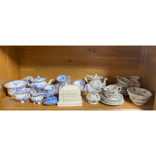 124 - A Cauldon china replica of Queen Mary's dolls house, a quantity of doll/nursery china -