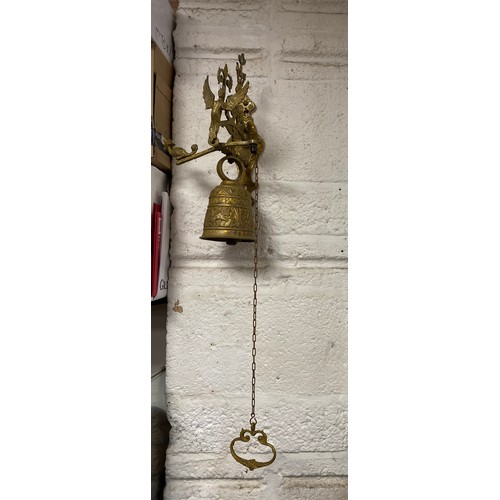 258 - A brass wall hanging bell -