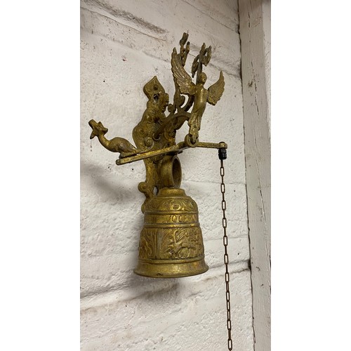 258 - A brass wall hanging bell -