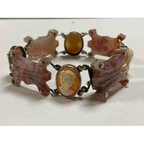 8 - A silver, hardstone and cameo set bracelet, composed of alternate shell cameo and shaped hardstone p... 