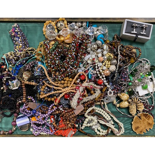 9 - A quantity of costume jewellery -