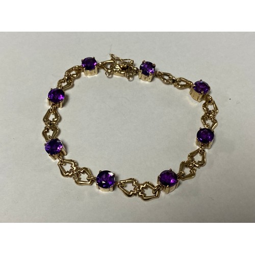 12 - A 9ct gold bracelet, set with circular amethysts and shaped links -