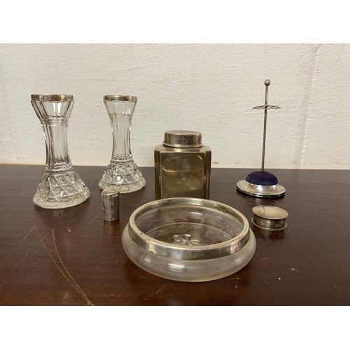 35 - A small group of silver items, various dates and makers, including caddy and cover, hatpin stand, pa... 