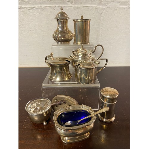 43 - A group of silver cruet items, various dates and makers -