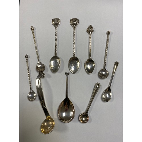 45 - A group of silver spoons, including Scottish with boat end -