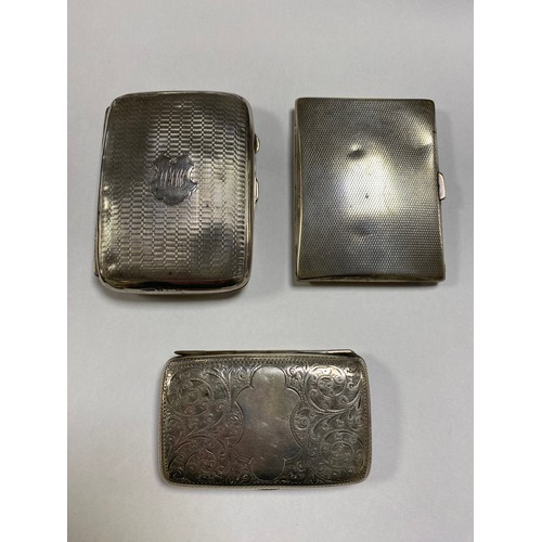 46 - A group of three silver cigarette cases, various dates and makers -