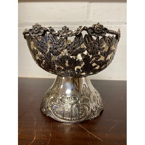 56 - A white metal pedestal bowl, stamped St silver, with floral pierced sides and 'C' scrolls to base -