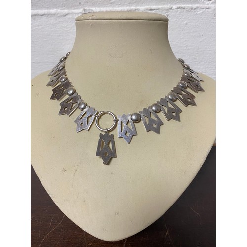 84 - A Victorian white metal collar necklace and pendant -